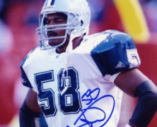 Keith Middlebrook signs 3 time Super Bowl Champion Dixon Edwards of the Dallas Cowboys